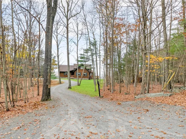 a view of outdoor space with deck and tree