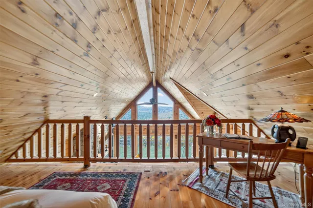 a view of a couches and dinning table in patio