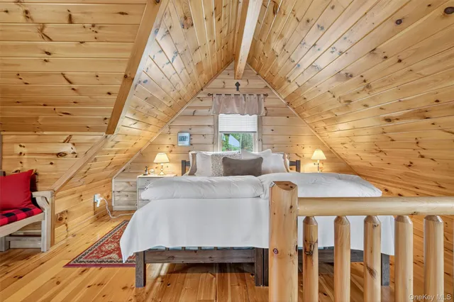 a view of a balcony with wooden floor
