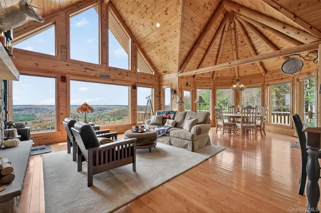 an outdoor living and dining space with furniture