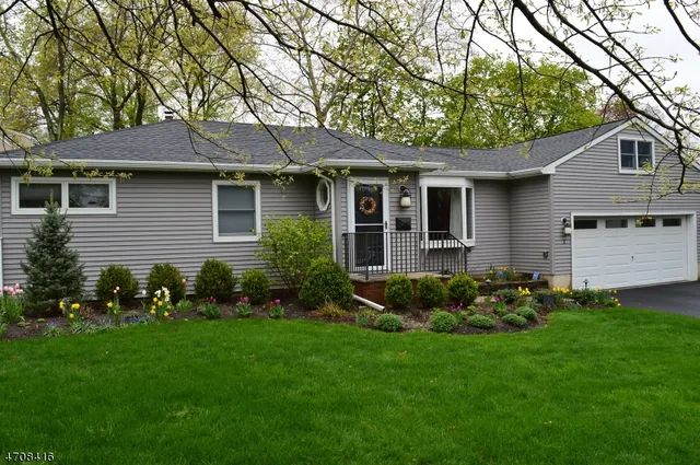 a view of a house with garden