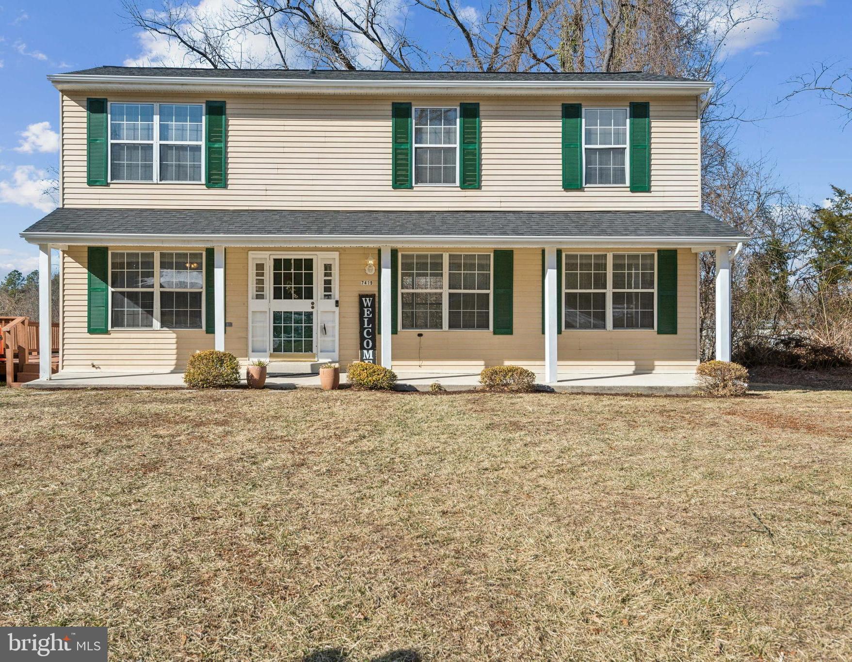 7419 Bentree Road Fort Washington, MD 20744 - Photo 1 of 31 front view of a house with a yard