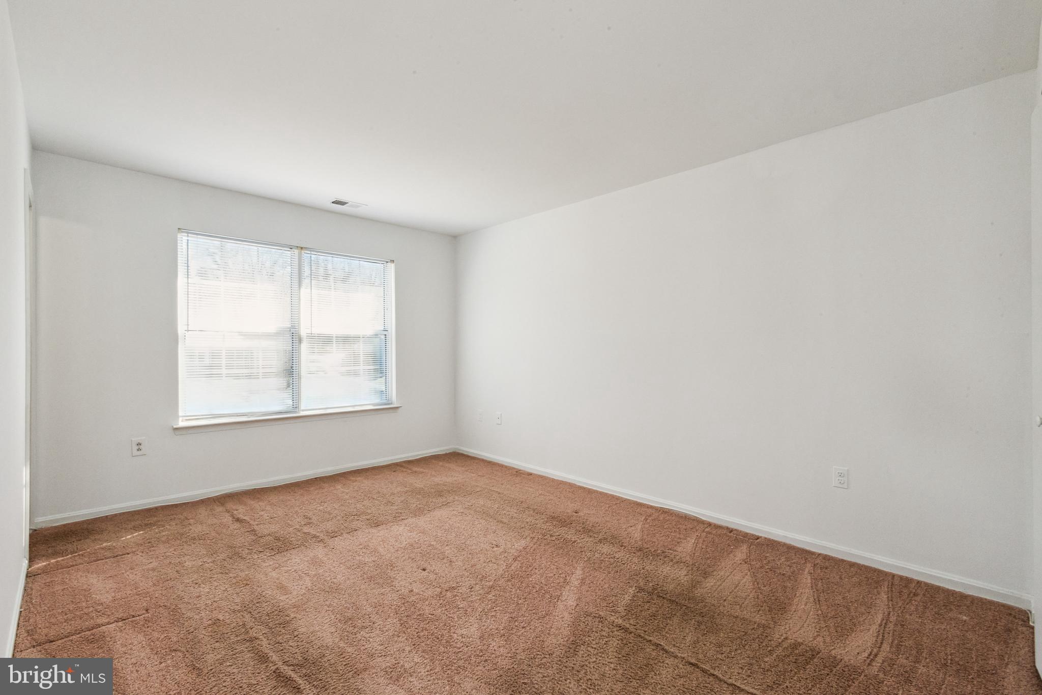 7419 Bentree Road Fort Washington, MD 20744 - Photo 13 of 31 an empty room with a window
