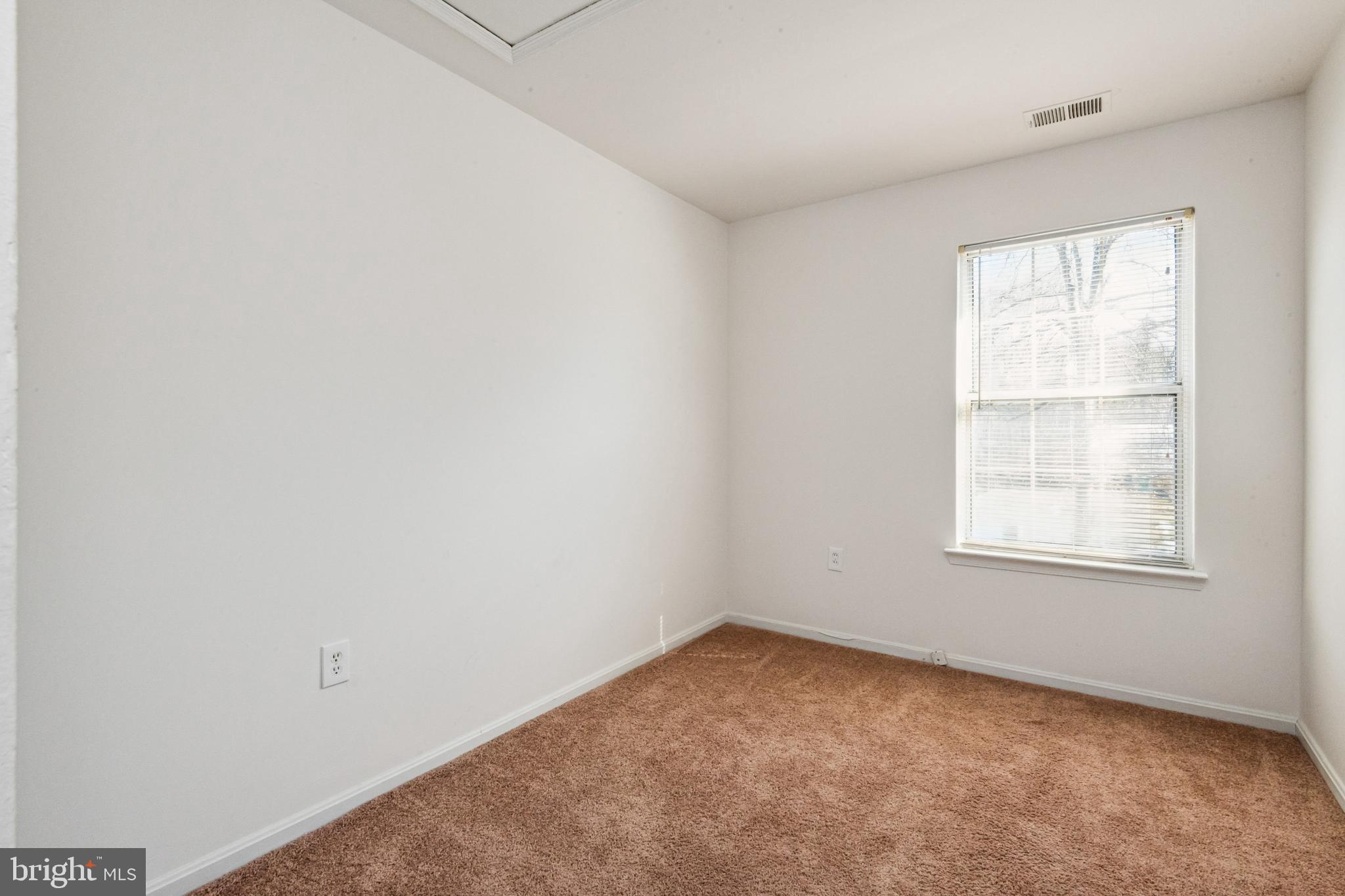 7419 Bentree Road Fort Washington, MD 20744 - Photo 15 of 31 an empty room with a window
