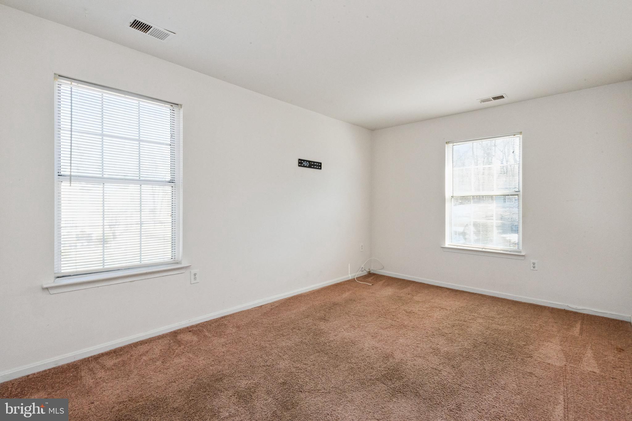 7419 Bentree Road Fort Washington, MD 20744 - Photo 16 of 31 an empty room with windows