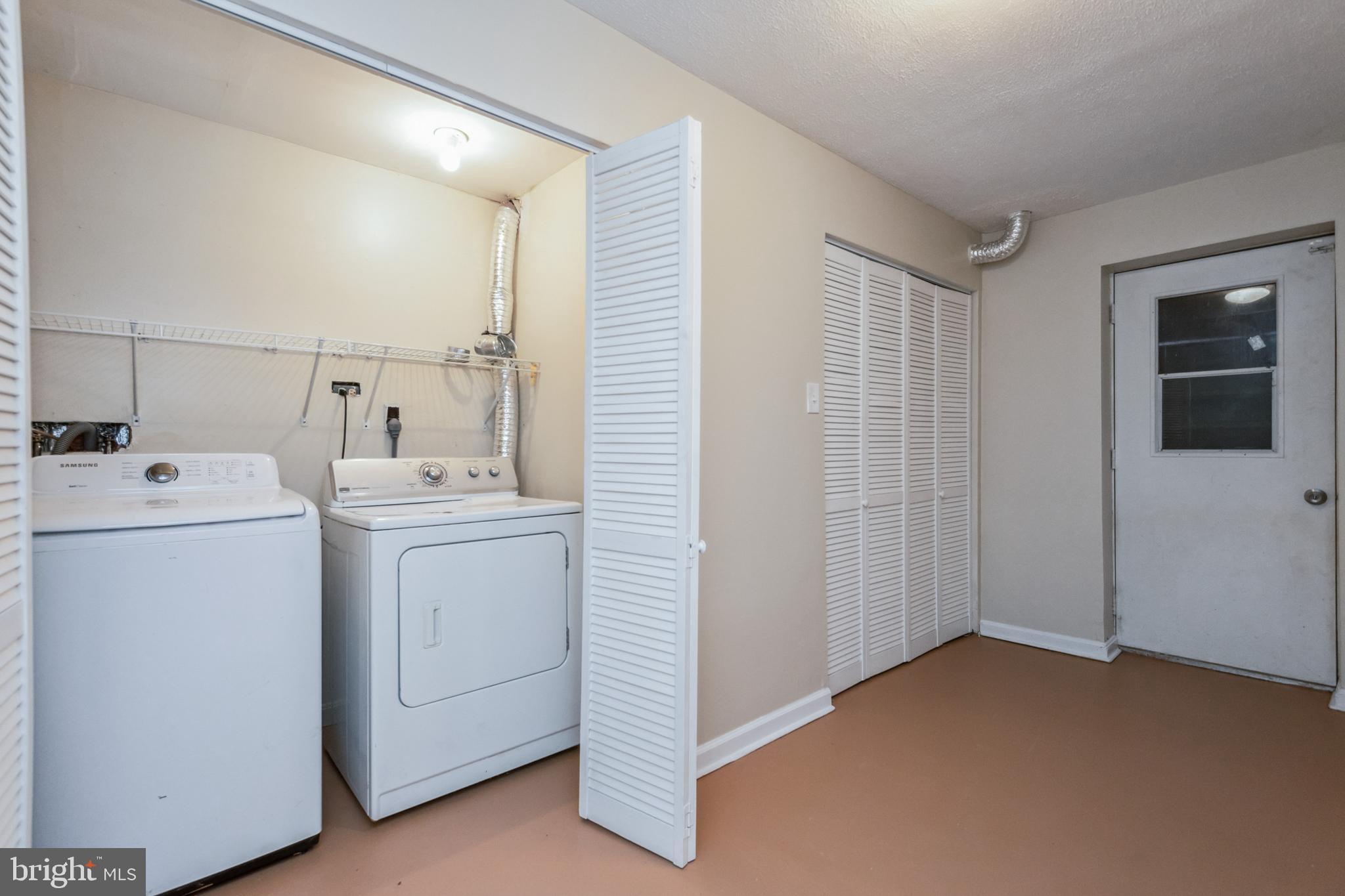 7419 Bentree Road Fort Washington, MD 20744 - Photo 24 of 31 a room with dryer and washer