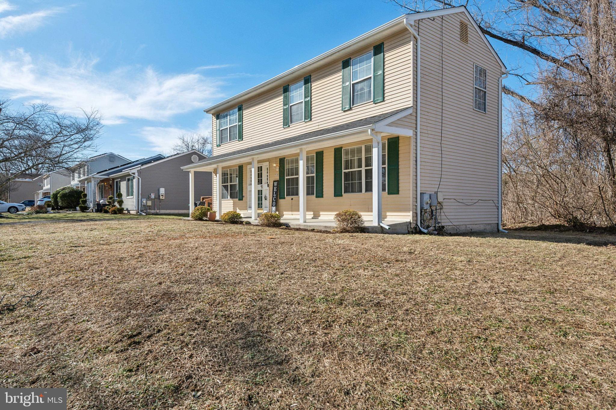 7419 Bentree Road Fort Washington, MD 20744 - Photo 3 of 31 a front view of a house with a yard