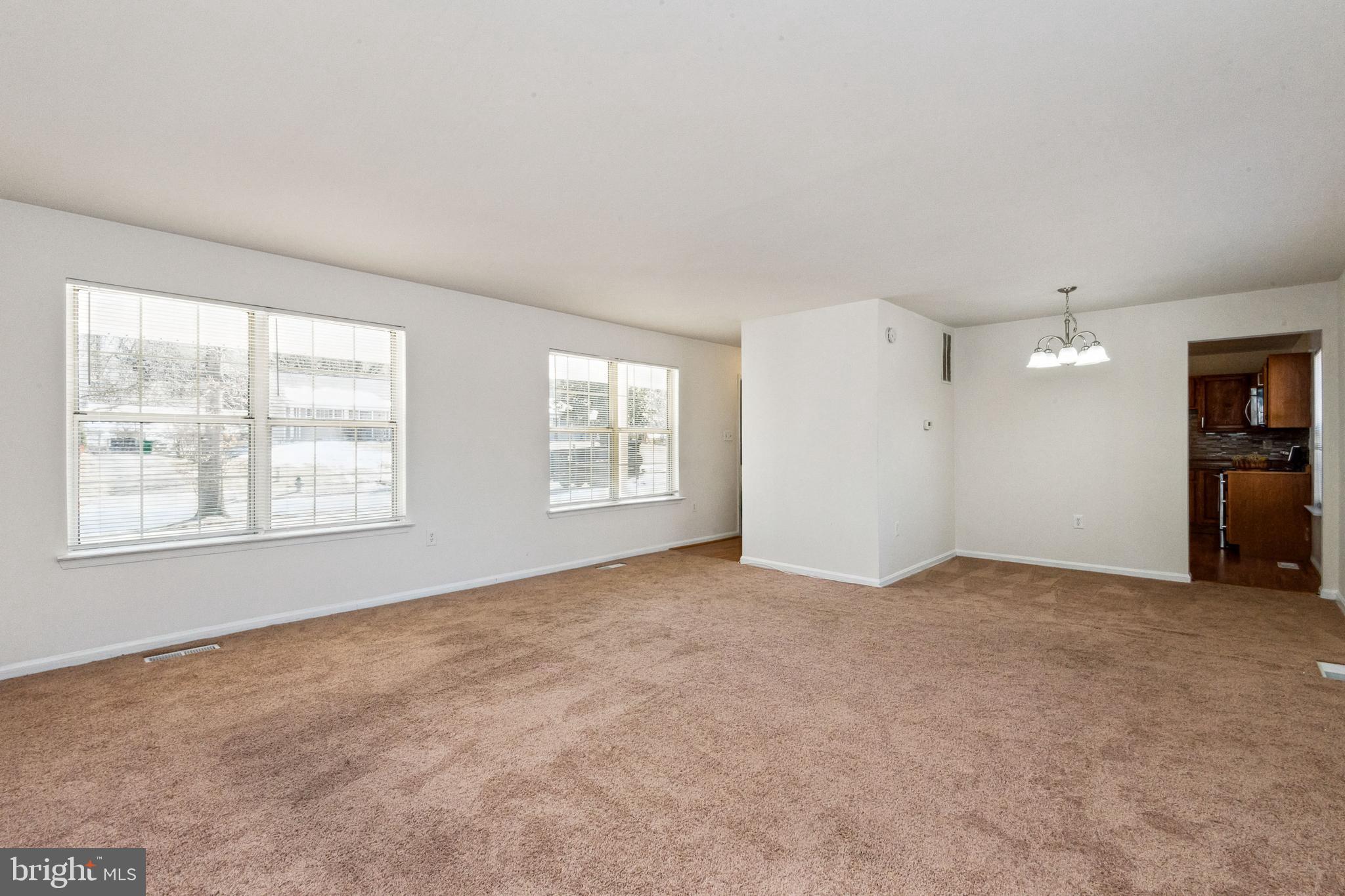 7419 Bentree Road Fort Washington, MD 20744 - Photo 7 of 31 an empty room with windows