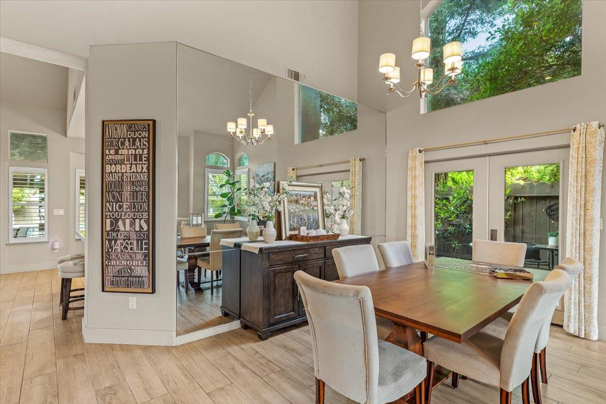 2485 Tigers Drive Turlock, CA 95382 - Photo 24 of 77 a view of a dining room with furniture window and wooden floor