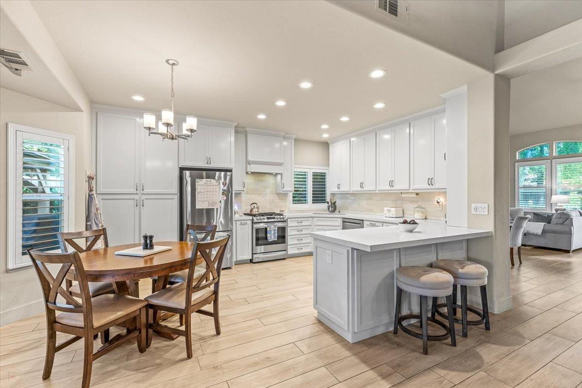 2485 Tigers Drive Turlock, CA 95382 - Photo 25 of 77 a view of a dining room kitchen and a window