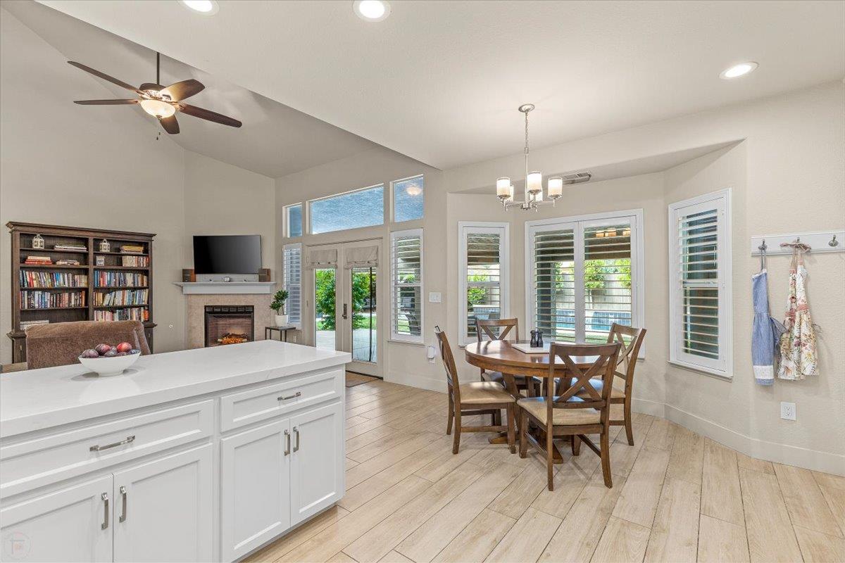 2485 Tigers Drive Turlock, CA 95382 - Photo 31 of 77 a view of a dining room with furniture window and wooden floor