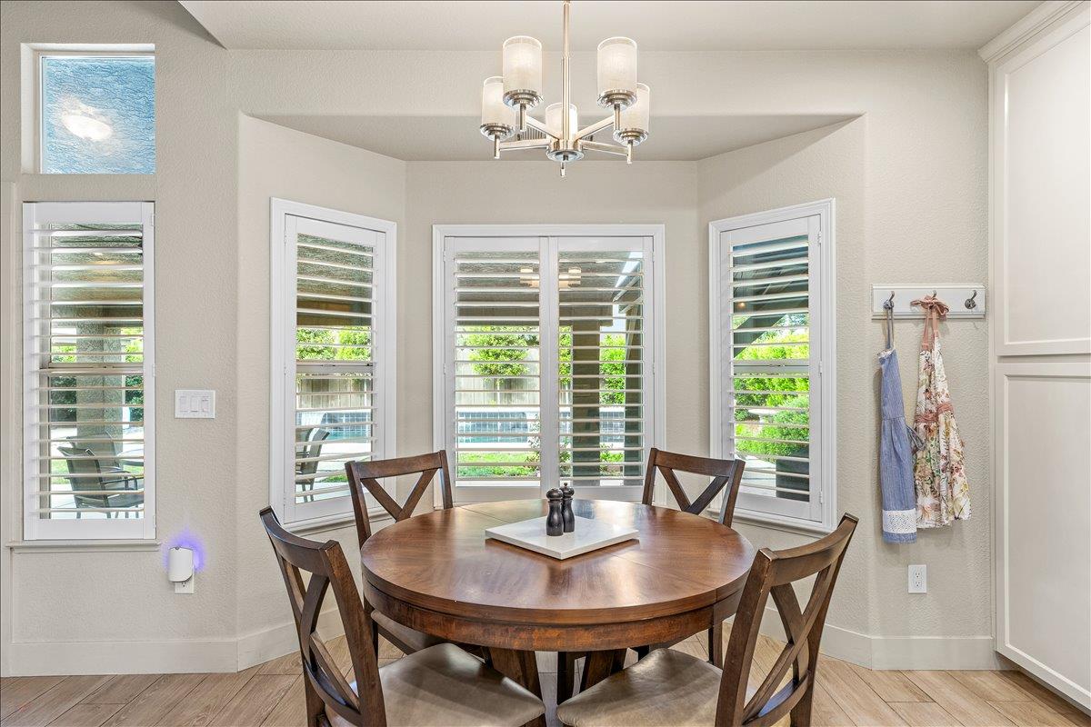 2485 Tigers Drive Turlock, CA 95382 - Photo 32 of 77 a view of a dining room with furniture window and outside view