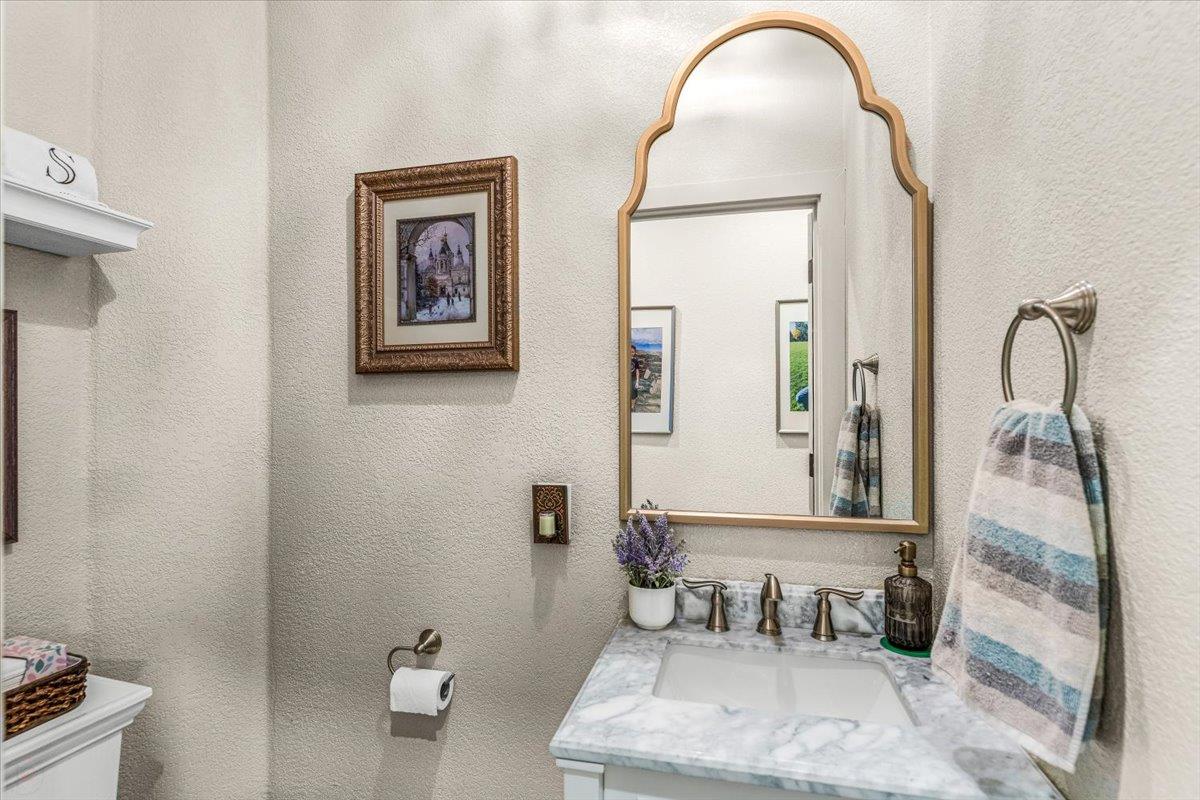 2485 Tigers Drive Turlock, CA 95382 - Photo 39 of 77 a bathroom with a toilet sink and tub