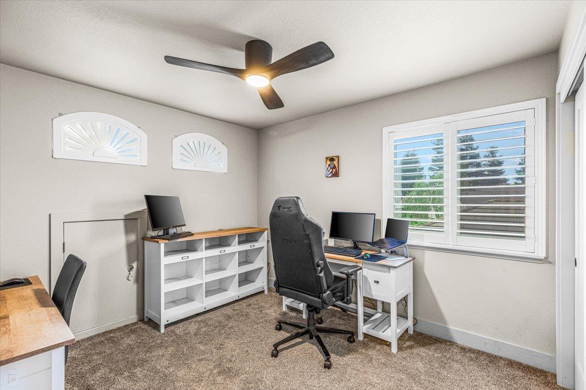 2485 Tigers Drive Turlock, CA 95382 - Photo 53 of 77 a view of a workspace with furniture and a window