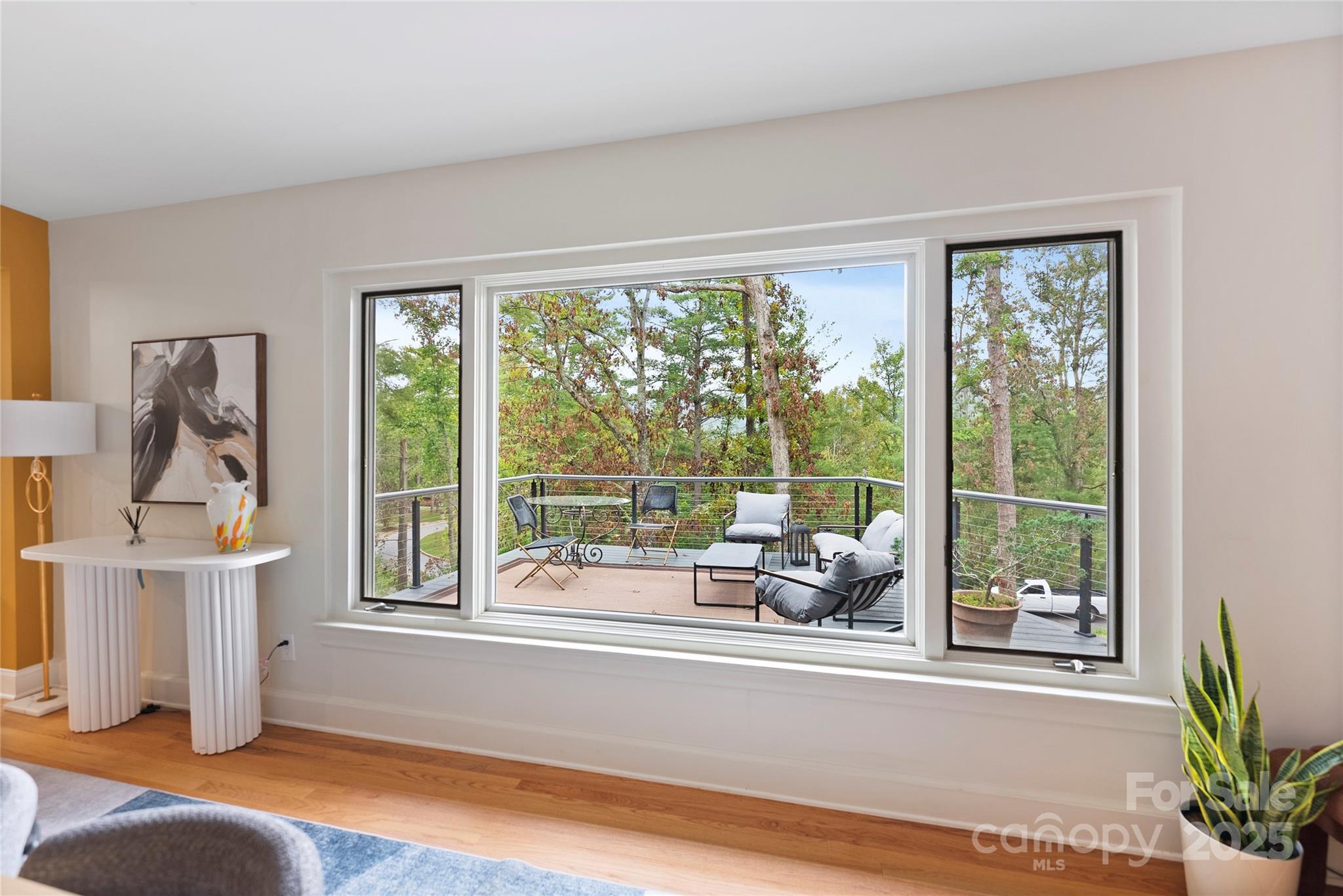 351 Windsor Road Asheville, NC 28804 - Photo 15 of 42 a living room with furniture and a large window