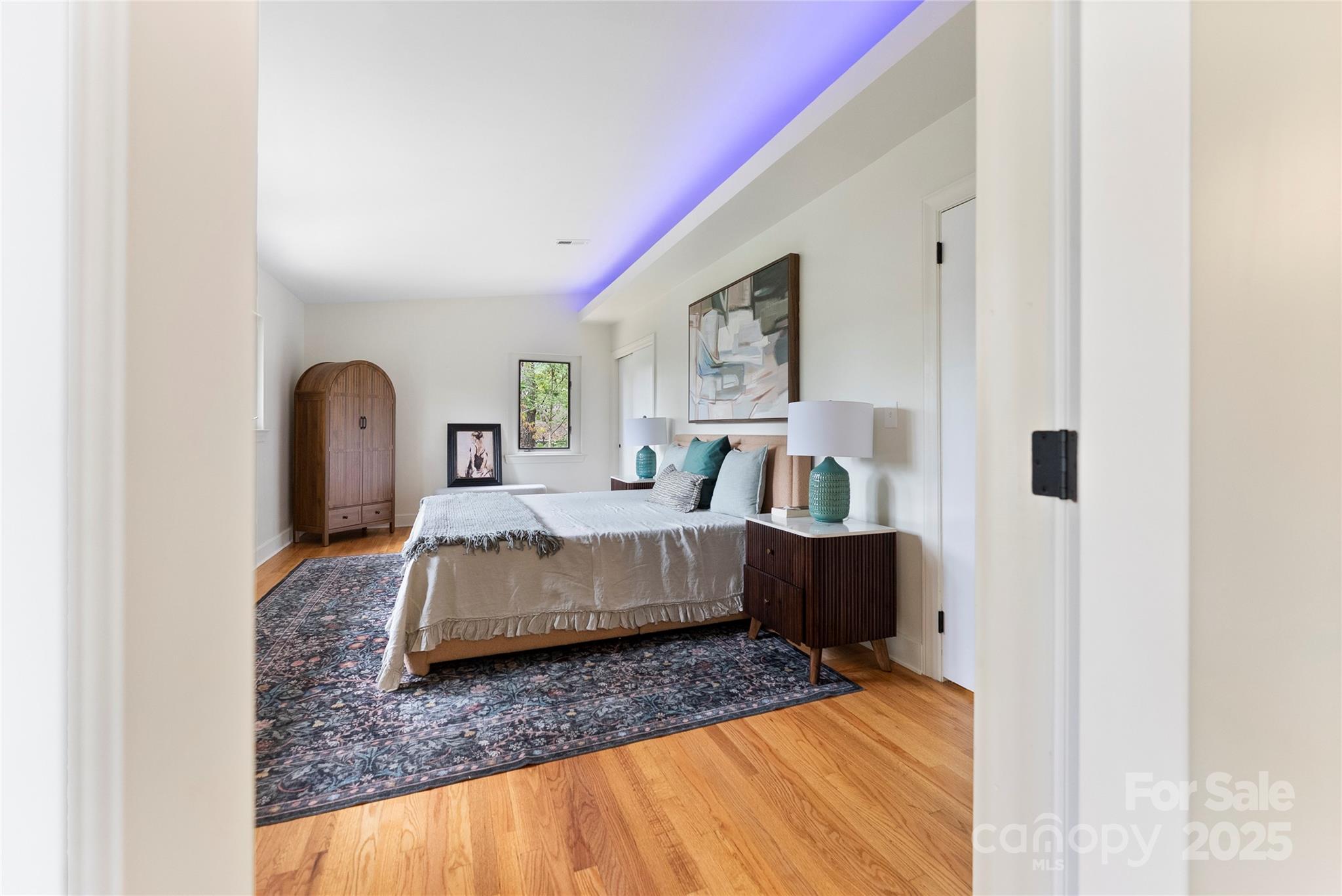 351 Windsor Road Asheville, NC 28804 - Photo 16 of 42 a bedroom with a bed couch and dresser