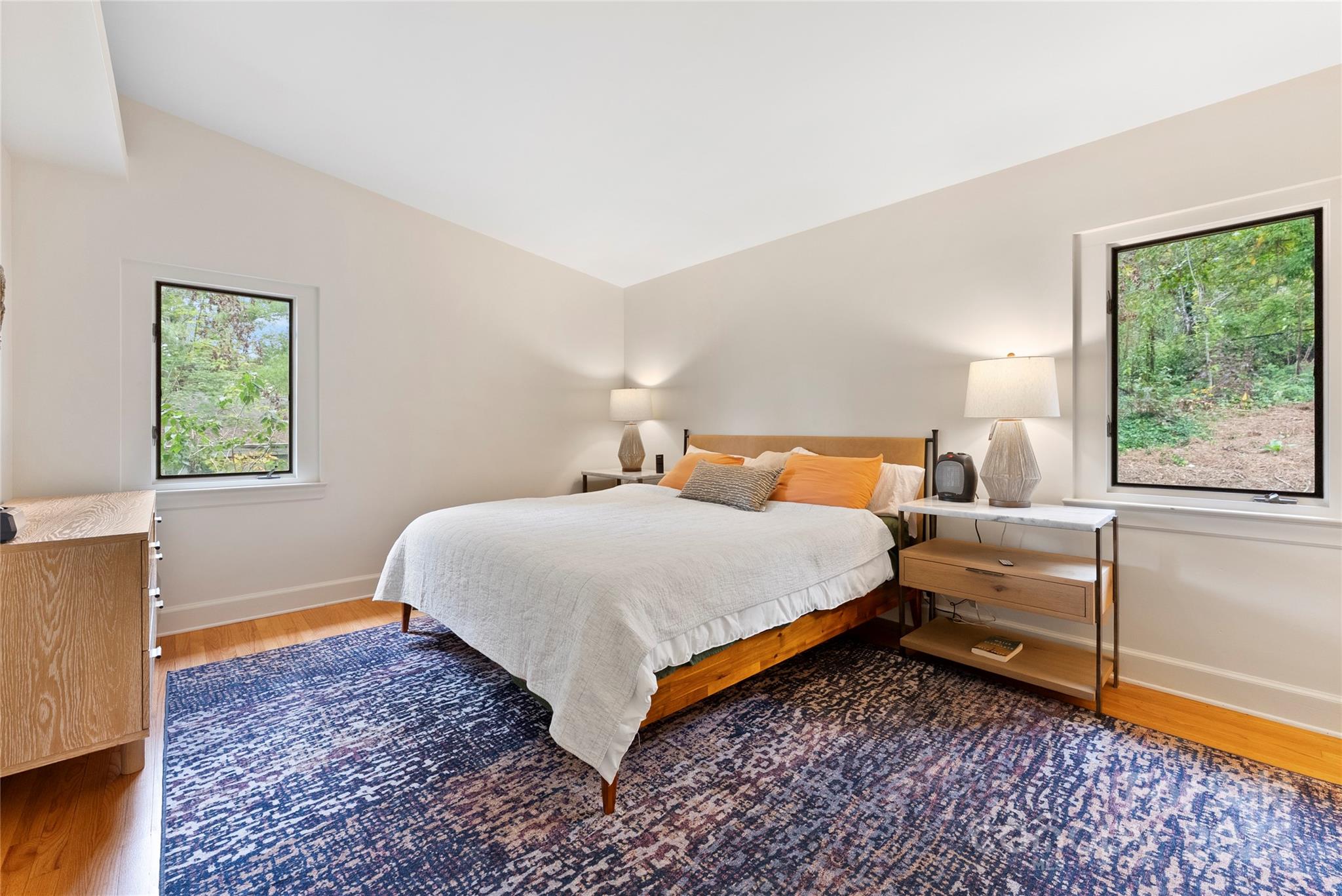 351 Windsor Road Asheville, NC 28804 - Photo 22 of 42 a bedroom with a bed and a window with outer view