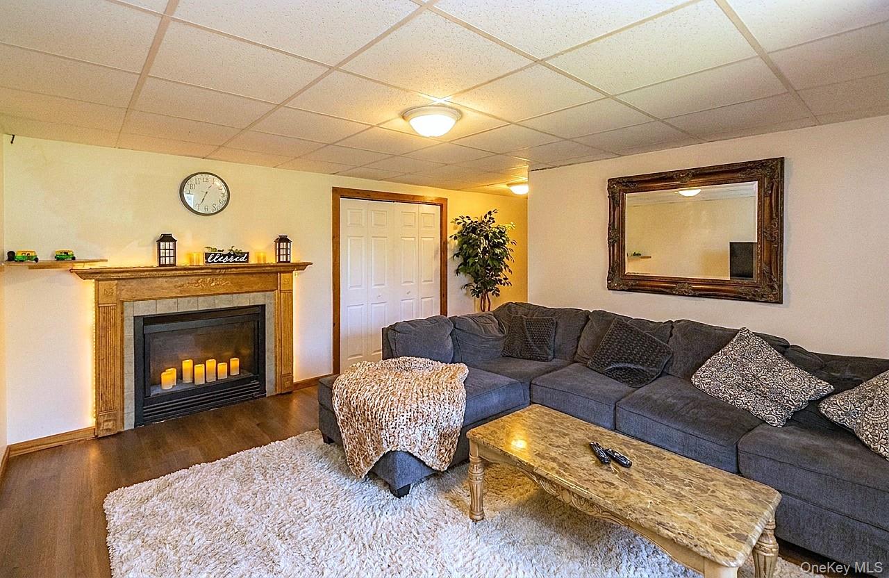 29 Murray Road Middletown, NY 10940 - Photo 14 of 24 a living room with furniture and a fireplace