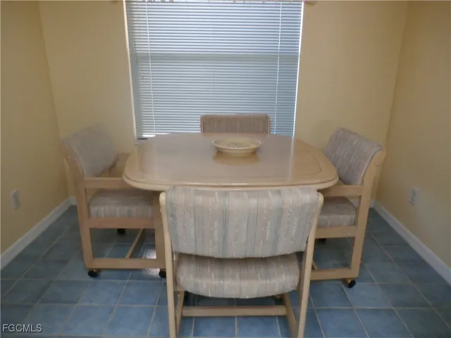 a table and chairs in a room