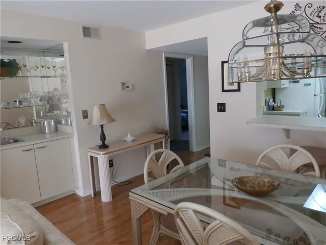 a view of a kitchen sink and natural light
