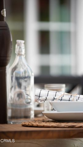 a vase of flowers sitting on a table