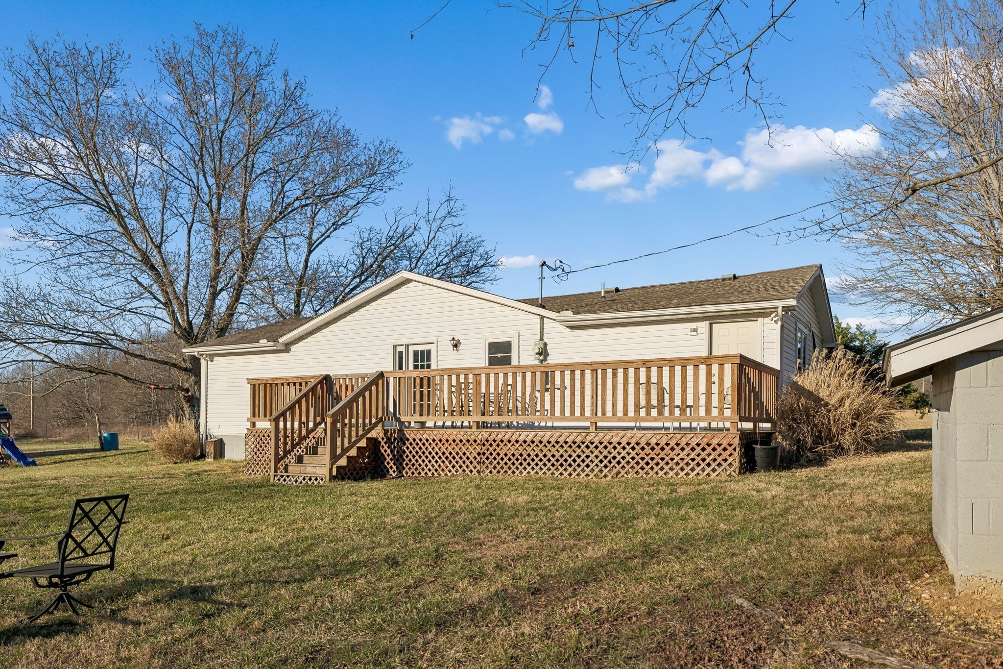 411 Purtle Road Lafayette, TN 37083 - Photo 28 of 40 a view of a house with a yard