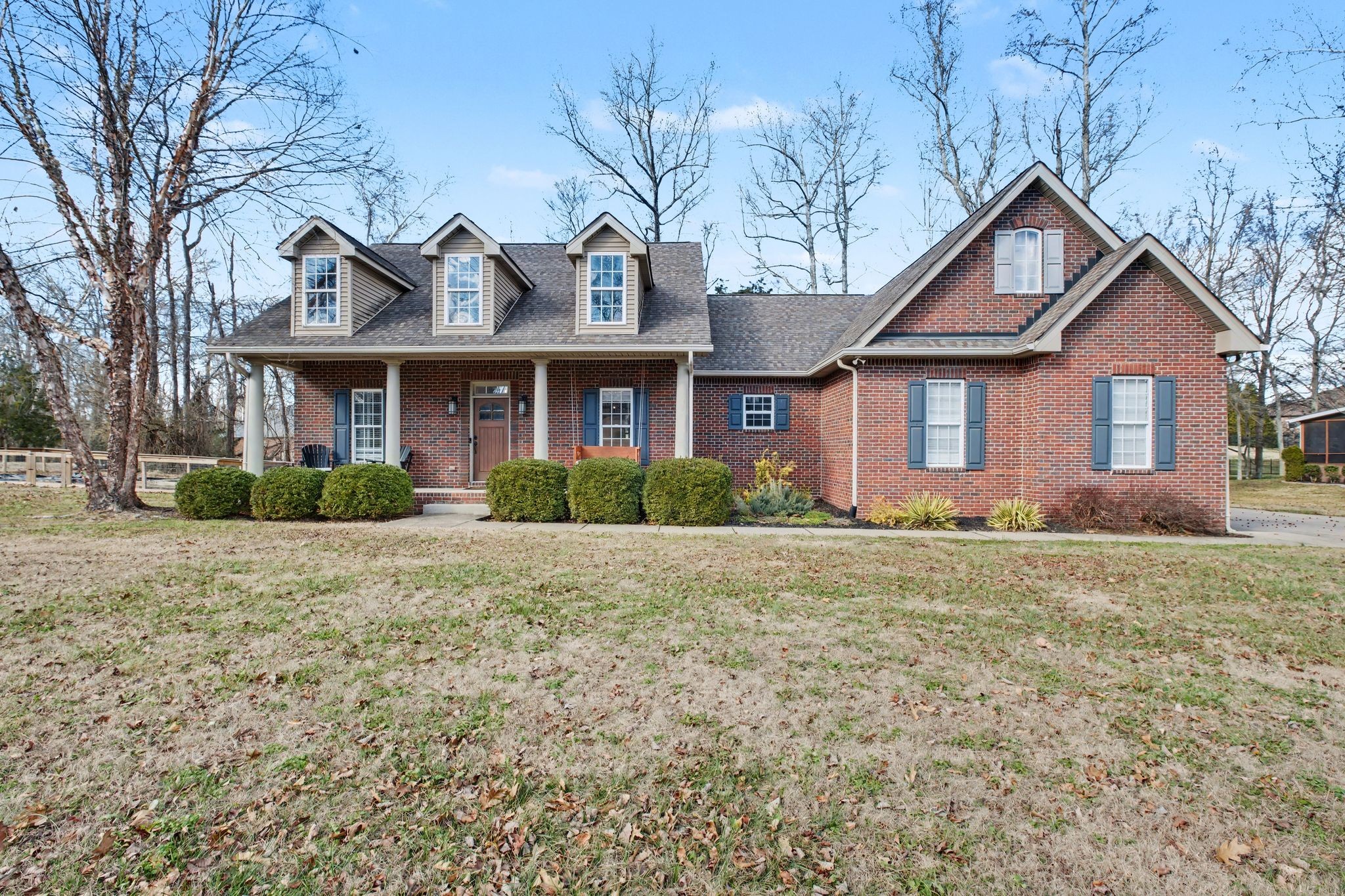 701 Deer Ridge Lane Lebanon, TN 37087 - Photo 1 of 41 a front view of a house with a garden and trees