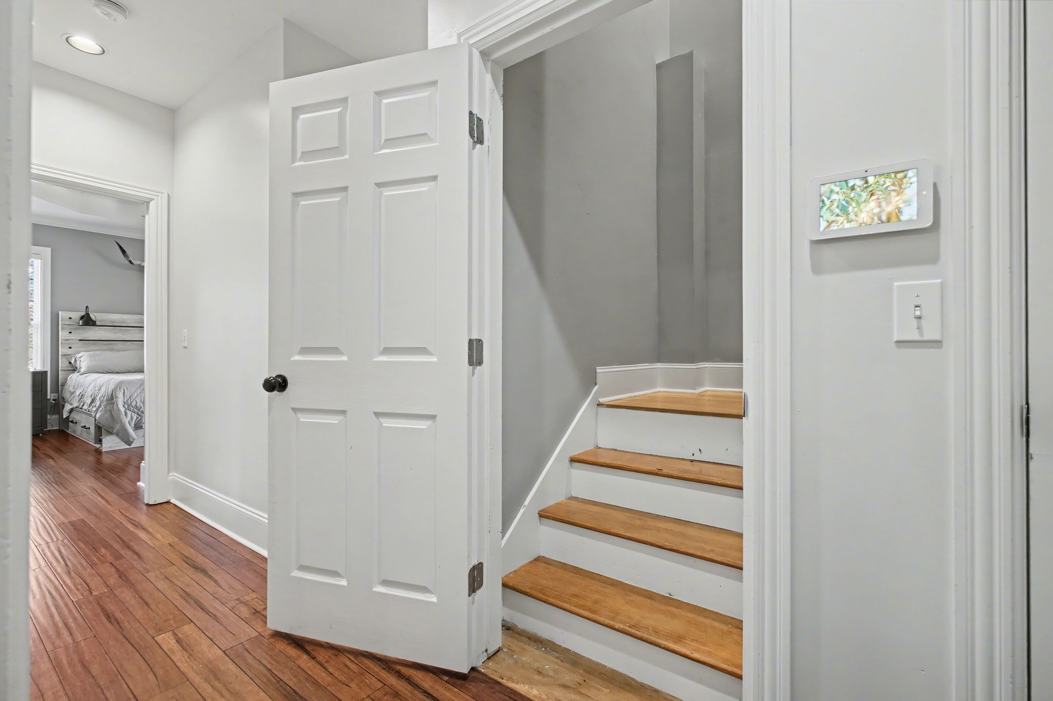 701 Deer Ridge Lane Lebanon, TN 37087 - Photo 30 of 41 a view of a hallway with wooden floor and staircase