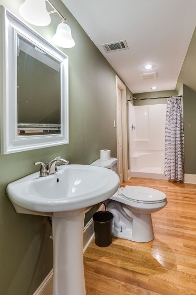 701 Deer Ridge Lane Lebanon, TN 37087 - Photo 40 of 41 a bathroom with a sink toilet and mirror