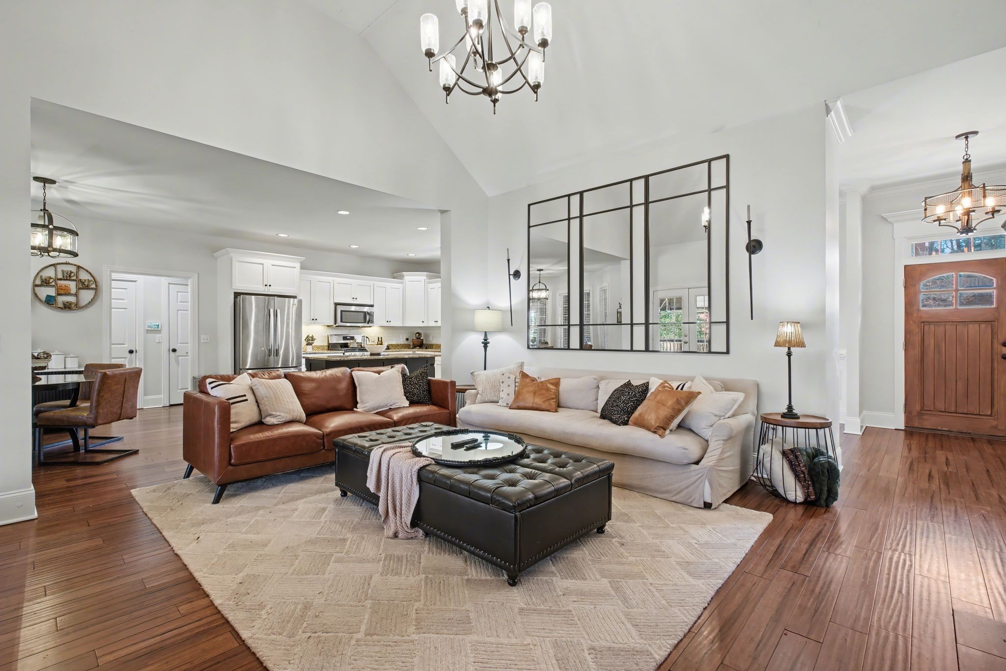 701 Deer Ridge Lane Lebanon, TN 37087 - Photo 10 of 41 a living room with furniture or couch and a chandelier