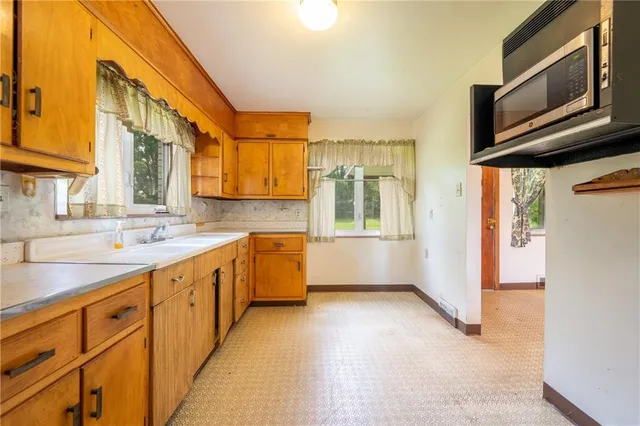 an empty room with windows