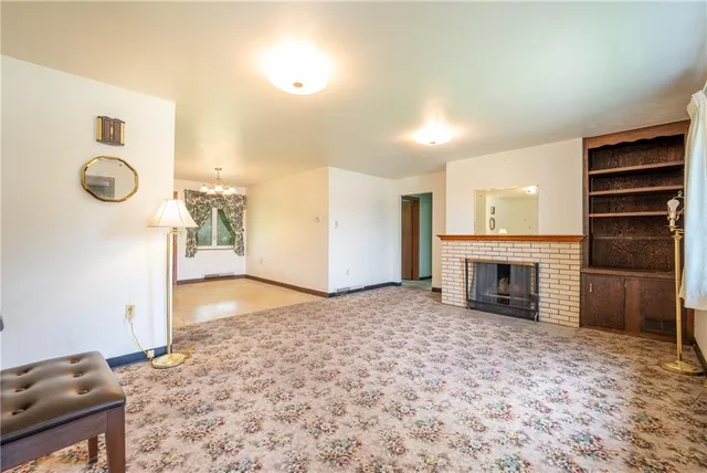 a view of a livingroom with a fireplace