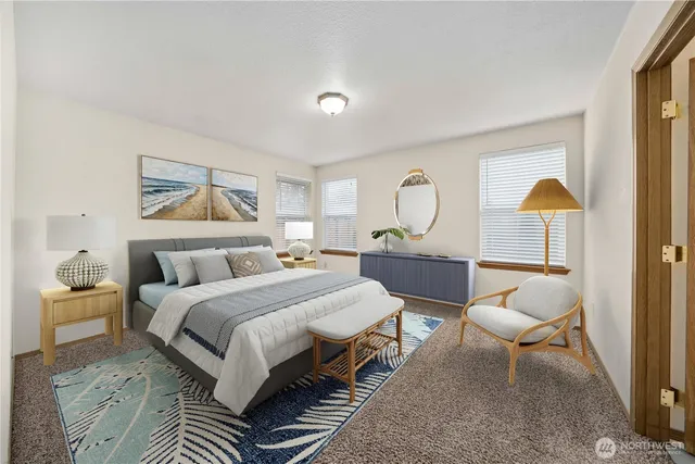 a bedroom with a bed and window