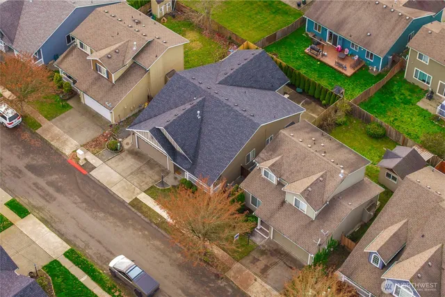 an aerial view of a house with a garden