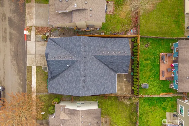 an aerial view of a house with swimming pool