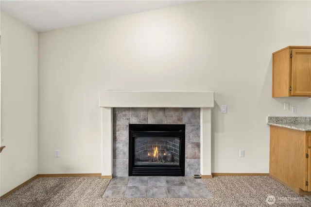 a living room with a fireplace