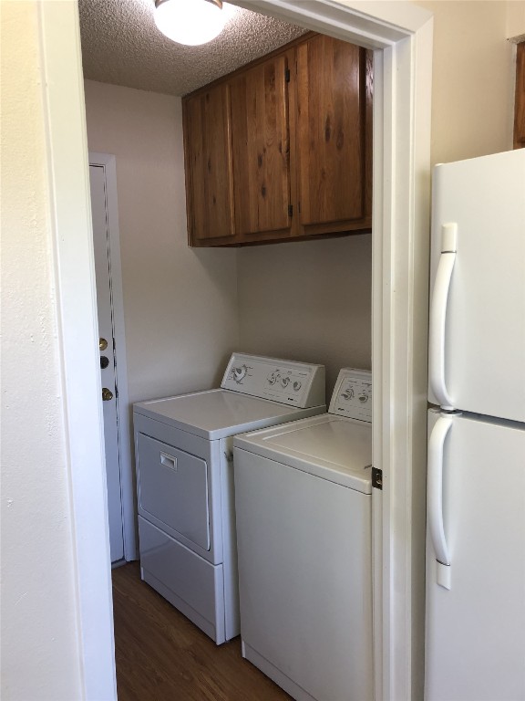 8300 Bradford Edward Cove, Unit B Austin, TX 78759 - Photo 6 of 15 a utility room with dryer and washer
