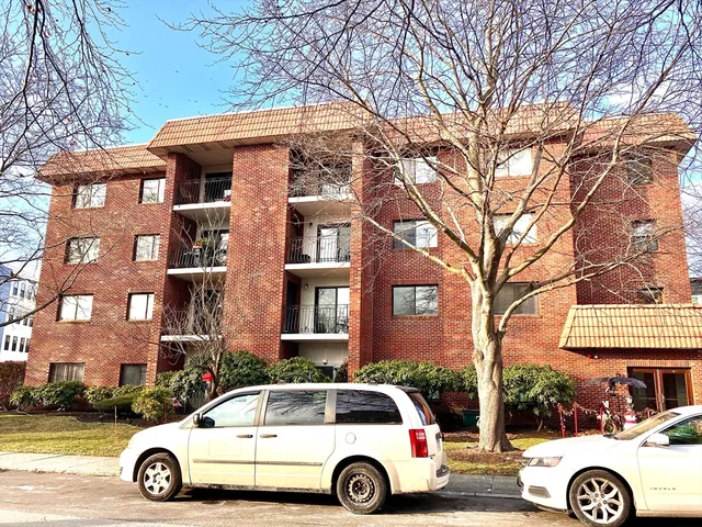 a car parked in front of a building