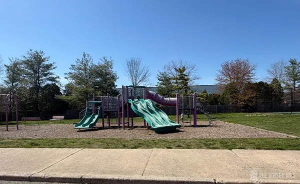 a view of a park with swings