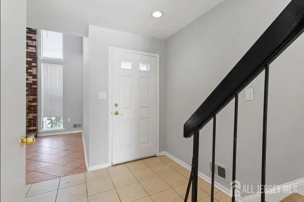 a view of an entryway with staircase