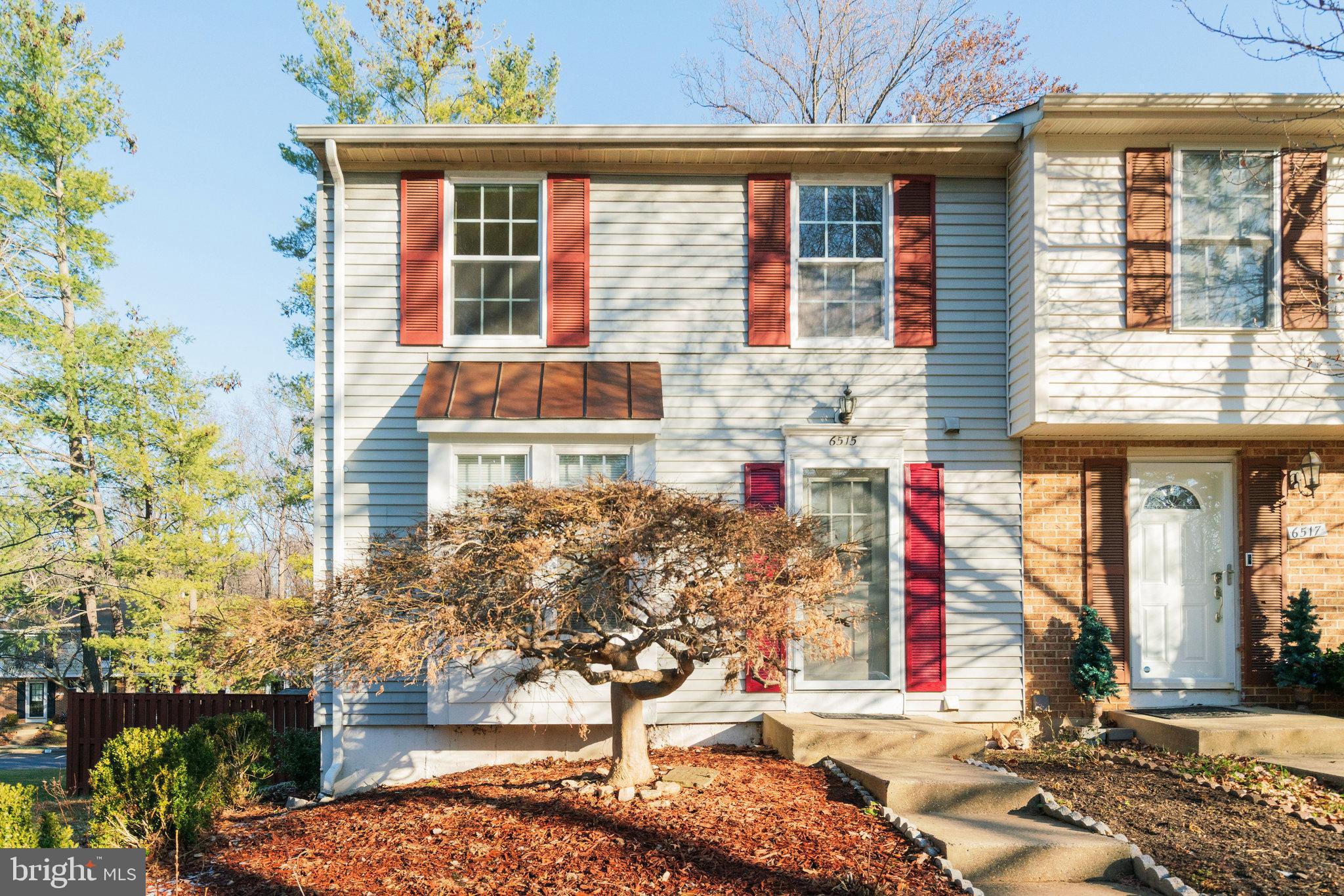 6515 Field Master Drive Springfield, VA 22152 - Photo 1 of 47 a front view of a house with a yard