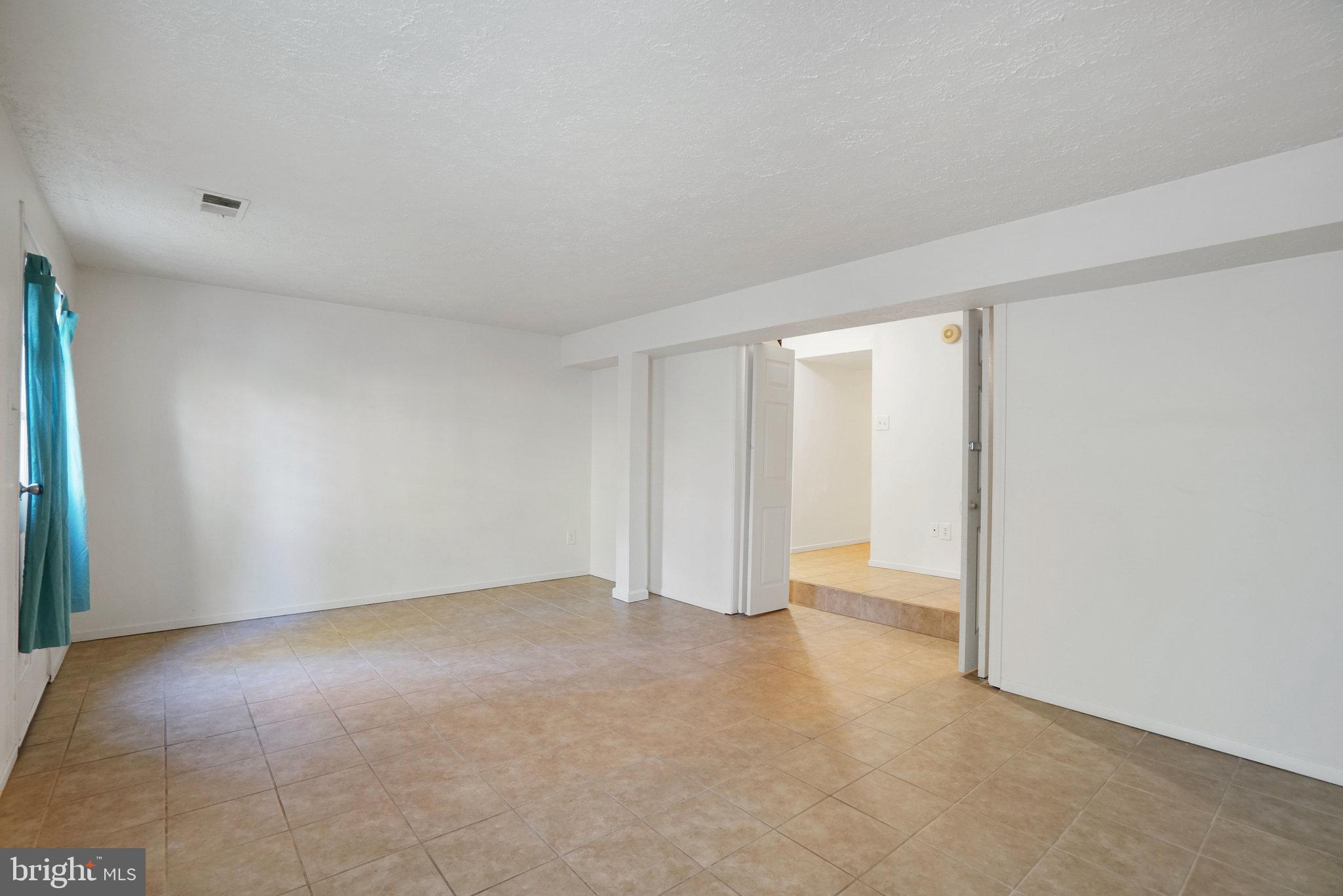 6515 Field Master Drive Springfield, VA 22152 - Photo 21 of 47 a view of an empty room and a window