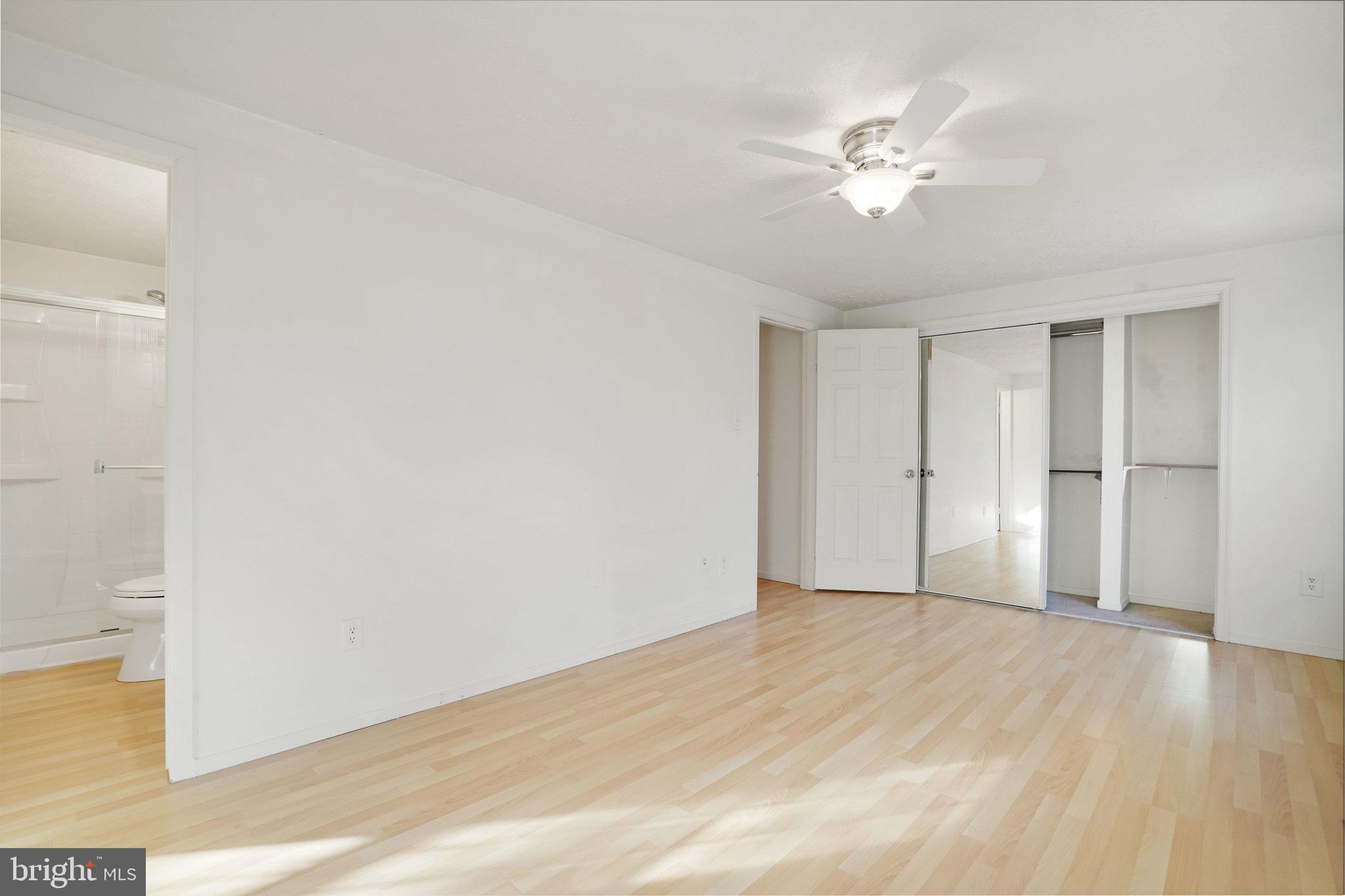 6515 Field Master Drive Springfield, VA 22152 - Photo 30 of 47 a view of an empty room with wooden floor