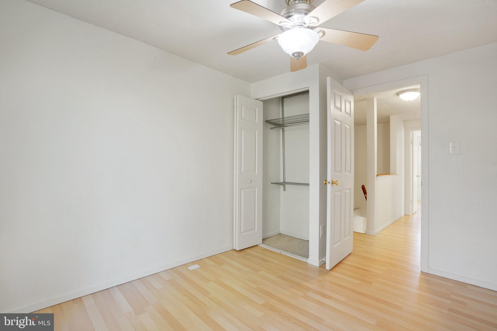 6515 Field Master Drive Springfield, VA 22152 - Photo 32 of 47 a view of an empty room and wooden floor