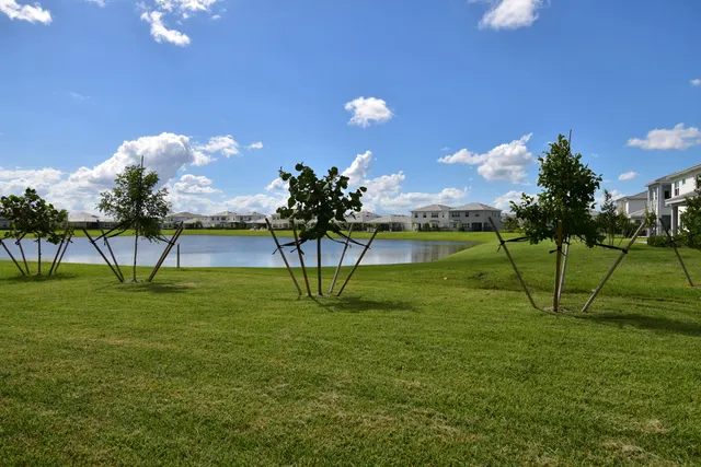 a view of a golf course with a lake