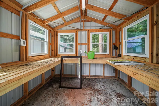 a kitchen with stainless steel appliances granite countertop a sink and a stove