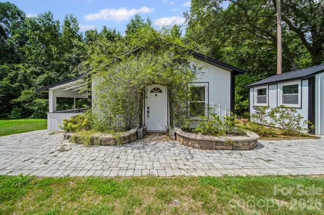 a front view of a house with a porch