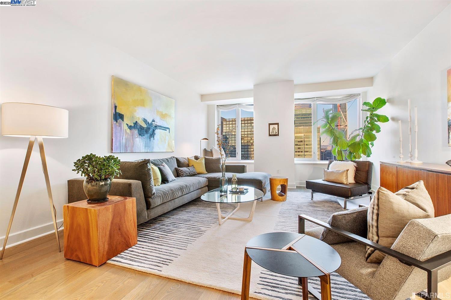 188 Minna, Unit 24F San Francisco, CA 94105 - Photo 3 of 11 a living room with furniture and a large window