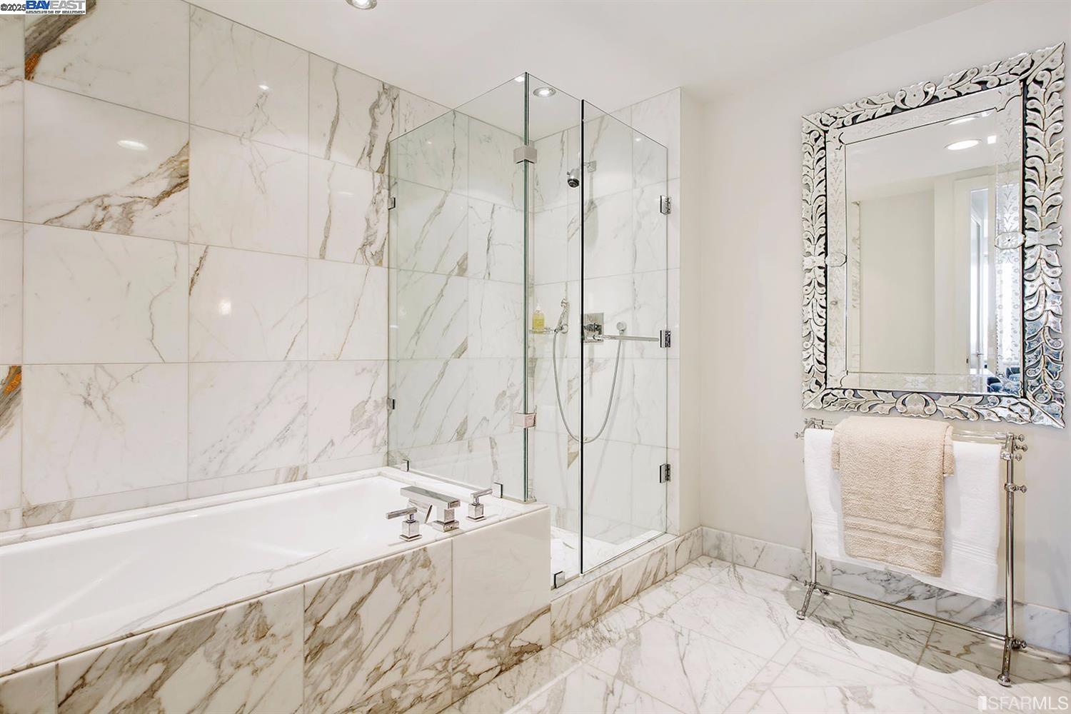 188 Minna, Unit 24F San Francisco, CA 94105 - Photo 8 of 11 a bathroom with a bathtub and a shower