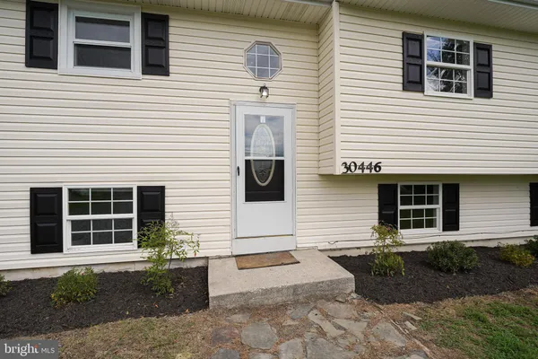 a view of a house and entrance